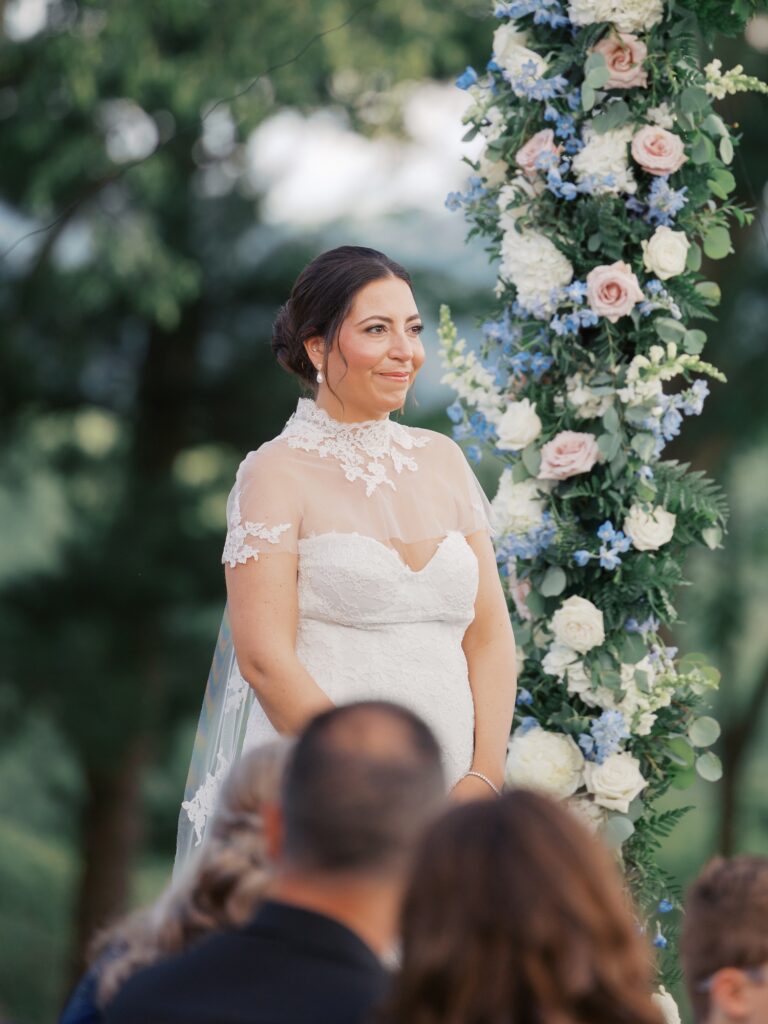 Outdoor summer wedding ceremony overlooking Natirar Park