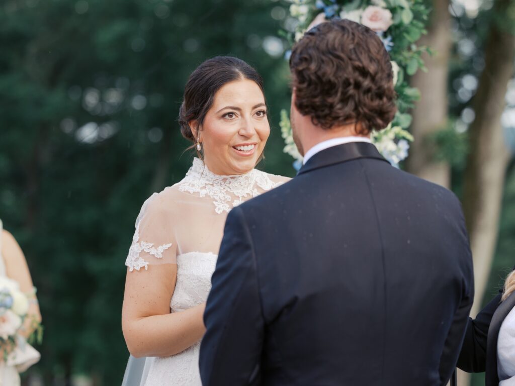 Outdoor summer wedding ceremony overlooking Natirar Park
