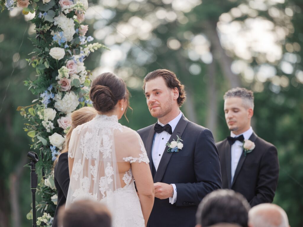Outdoor summer wedding ceremony overlooking Natirar Park