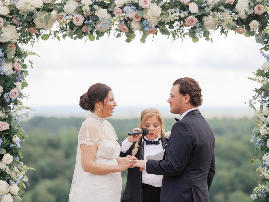 Outdoor summer wedding ceremony overlooking Natirar Park
