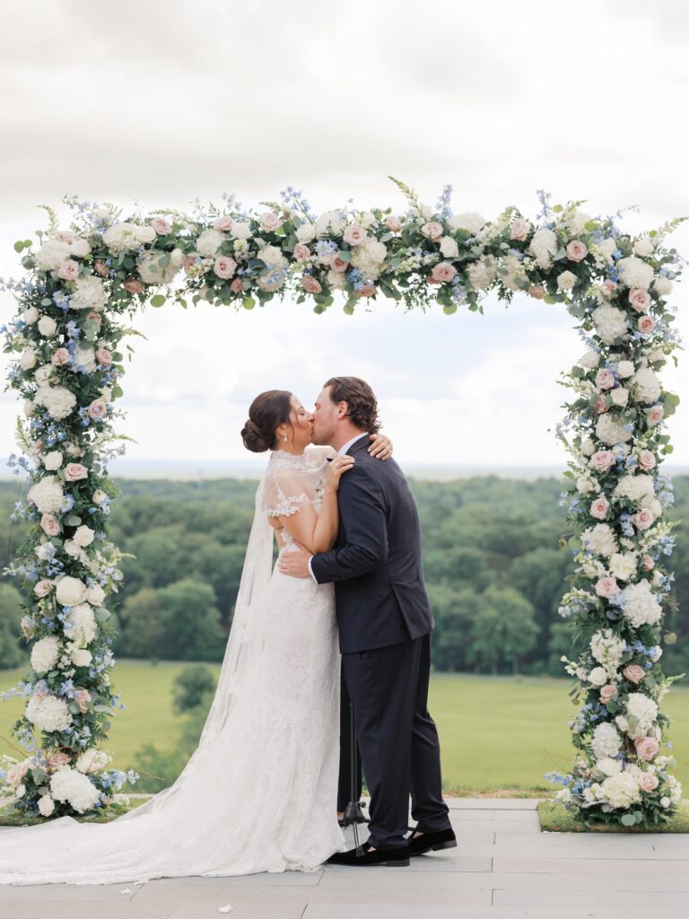 Outdoor summer wedding ceremony overlooking Natirar Park